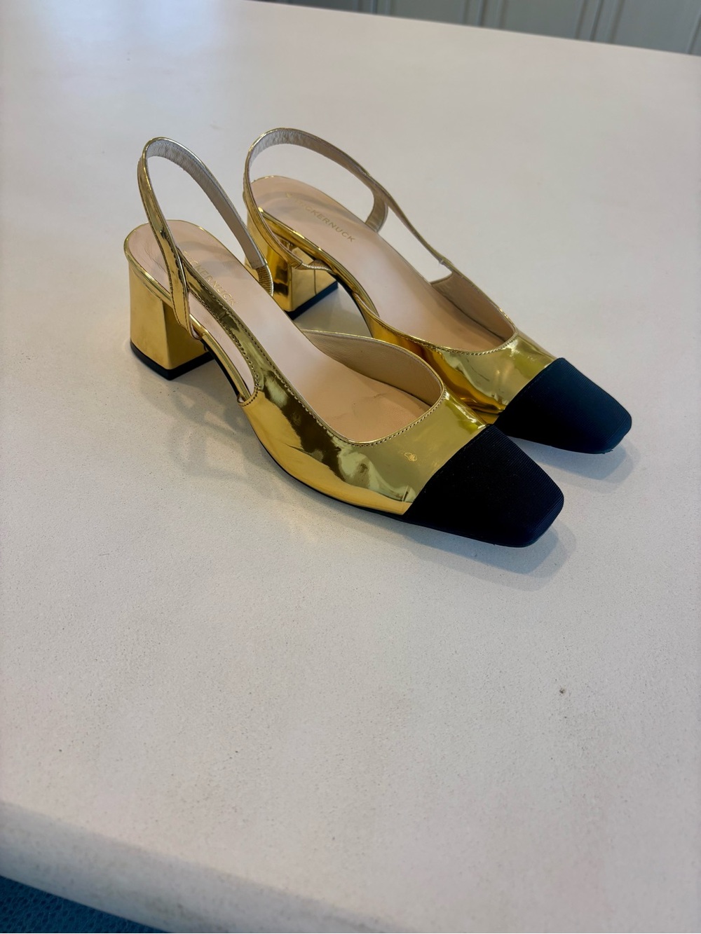 Tuckernuck Gold Slingback Pumps with Black Cap Toe